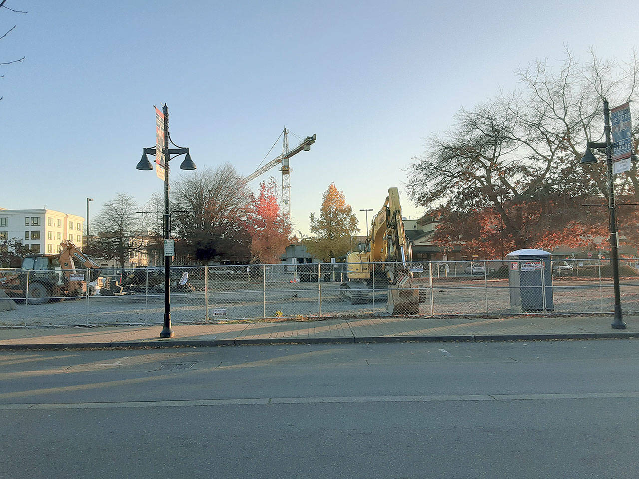 The future developers of the block across West Main from Auburn City Hall have rolled in equipment to turn and cleanse dirty soil left by activity on the site in the long ago. ROBERT WHALE, Auburn Reporter