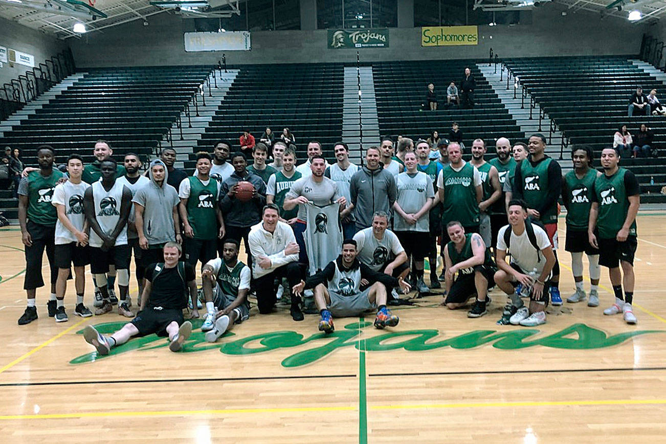 Alumni night: Trojan players from the past reunite for fun, and some games