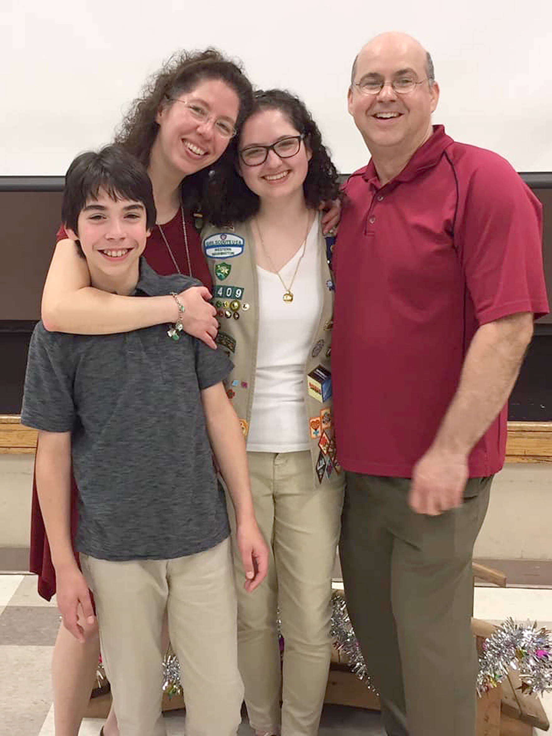 Arina Poggioli stands with her family after earning her Girl Scout Gold Award in May. COURTESY PHOTO, Poggioli