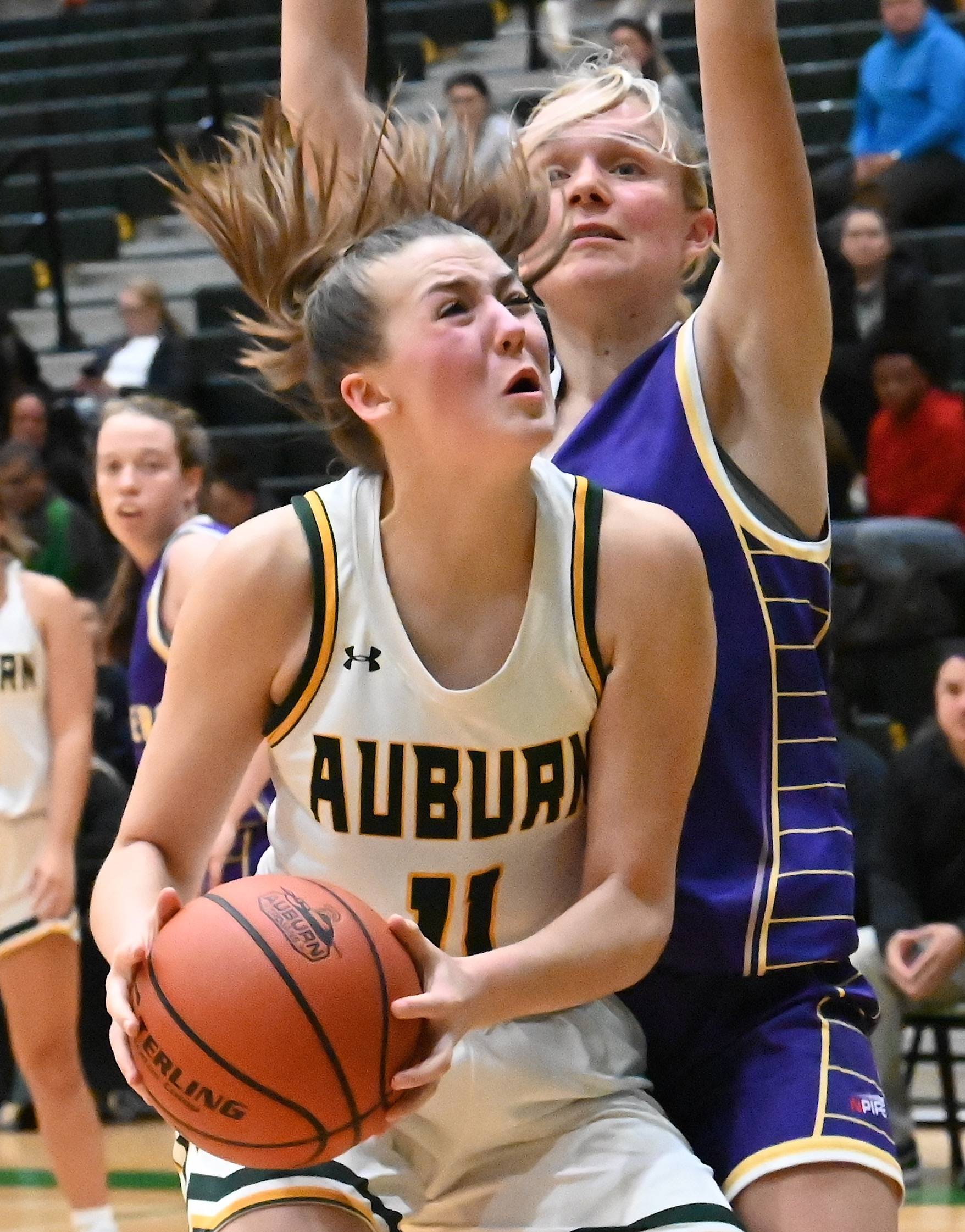 Auburn’s Emily Strojan muscles her way inside against the Australians. Strojan finished with seven points in the game. RACHEL CIAMPI, Auburn Reporter