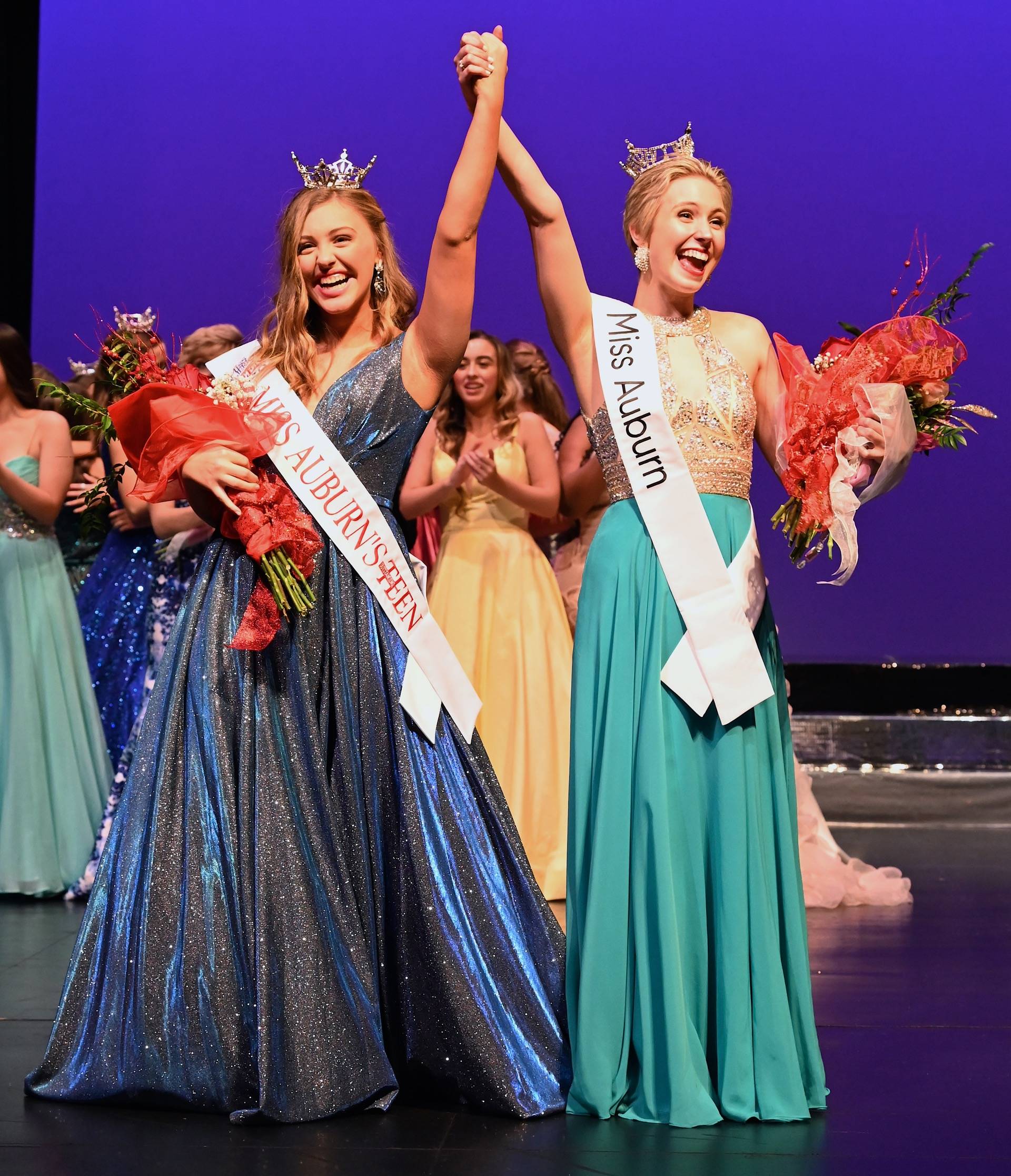 2020 pageant winners Miss Auburn Teen Madison Lindsay, left, and Miss Auburn Cami Werden celebrate on stage Saturday night. RACHEL CIAMPI, Auburn Reporter