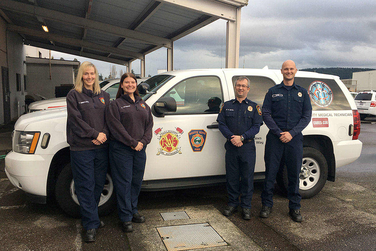 From left, social workers Tamara Liebich-Lantz and Carrie Talamaivao, SKFR Capt. Roy Smith and VRFA Firefighter Johan Friis smile for a photo in front of the CARES SUV at the Valley Regional Fire Authority Station 35. Photo courtesy of CARES