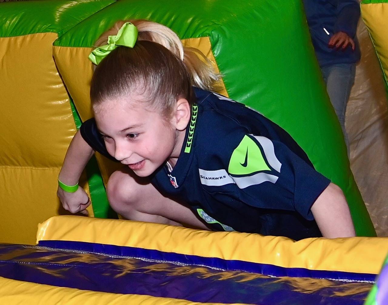 Addyson Blumenthal, 7, negotiates the obstacle course during Future Lions Family Fitness Night at Auburn Mountainview High School. RACHEL CIAMPI, Auburn Reporter