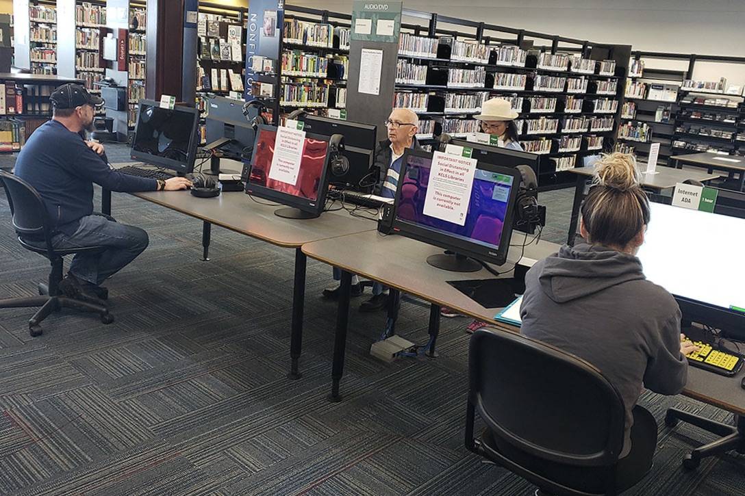 Before the King County Library System announced it was closing all libraries, it was enforcing new social distances policies, like limiting the number of computers available in order to keep people at least six feet apart. RAY MILLER-STILL, Enumclaw Courier-Herald
