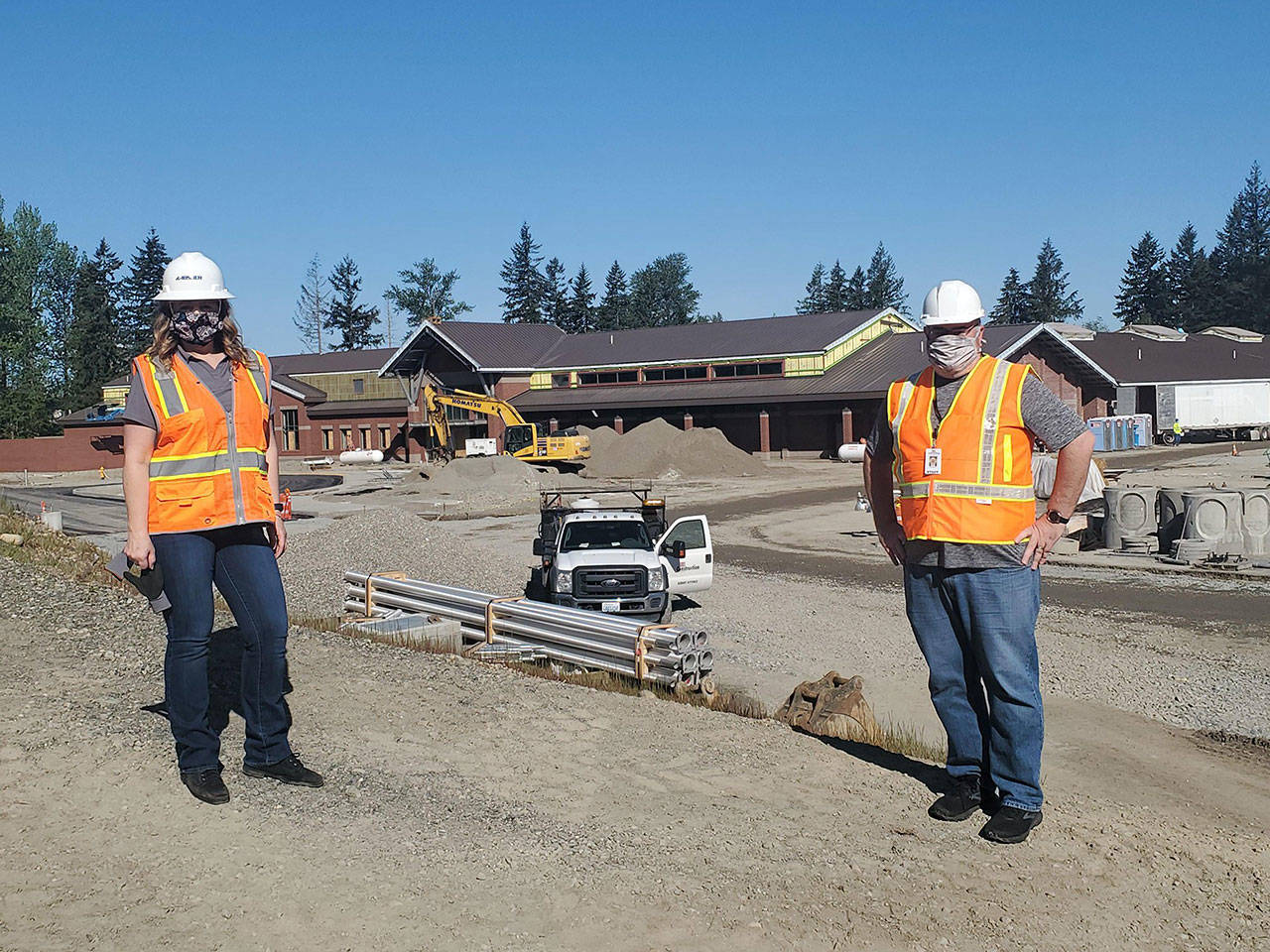 Associate Superintendent Cynthia Blansfield, left, and Superintendent Alan Spicciati tour Auburn School District’s new Bowman Creek Elementary scheduled to open in the fall. COURTESY PHOTO, Auburn School District