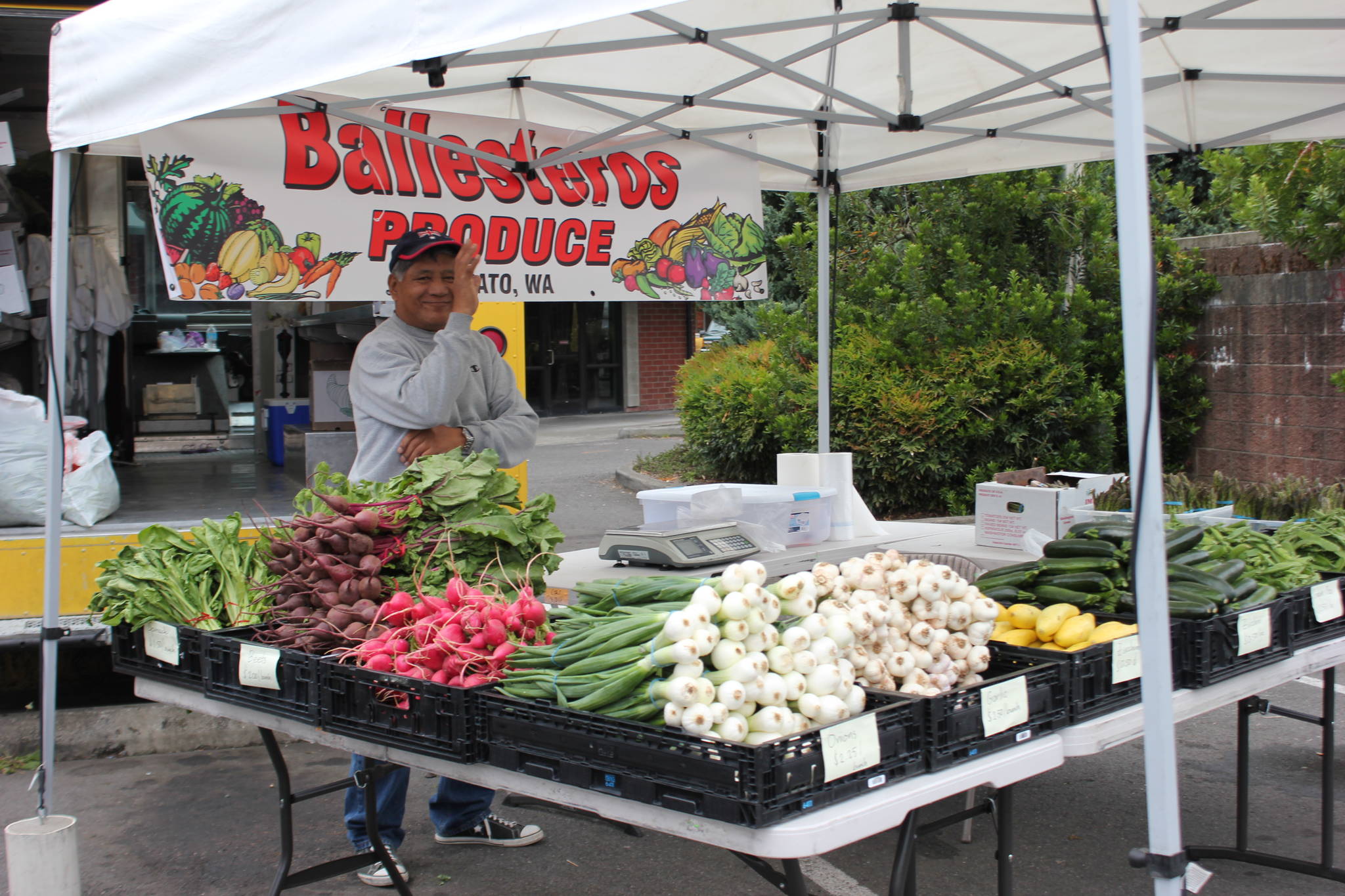 Courtesy photo                                 In this image from the 2019 Auburn Farmers Market, Ballesteros Produce displays its goods.