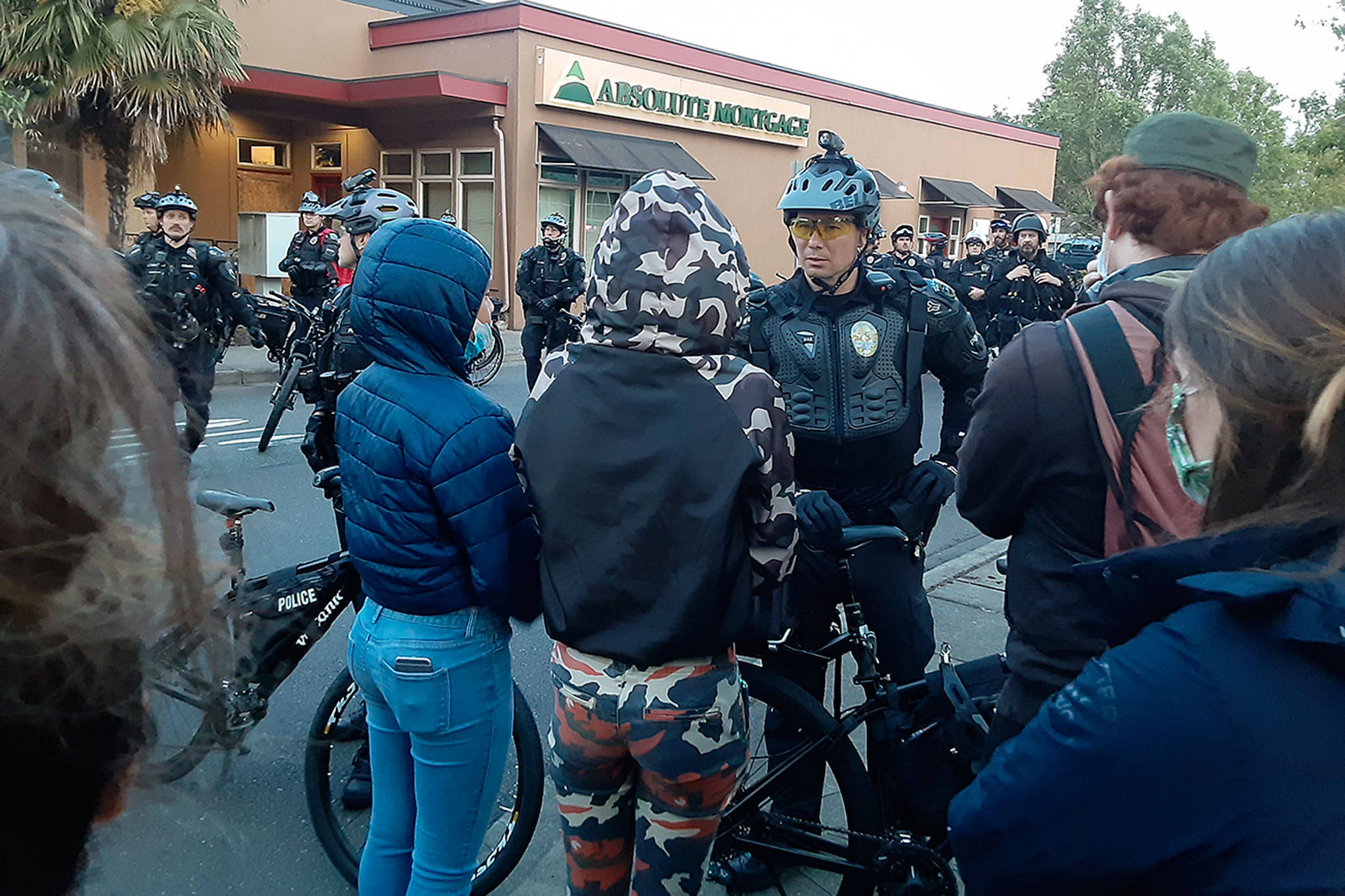 Protesters confront Auburn police on June 2, 2020, in downtown Auburn. Photo by Robert Whale/Auburn Reporter