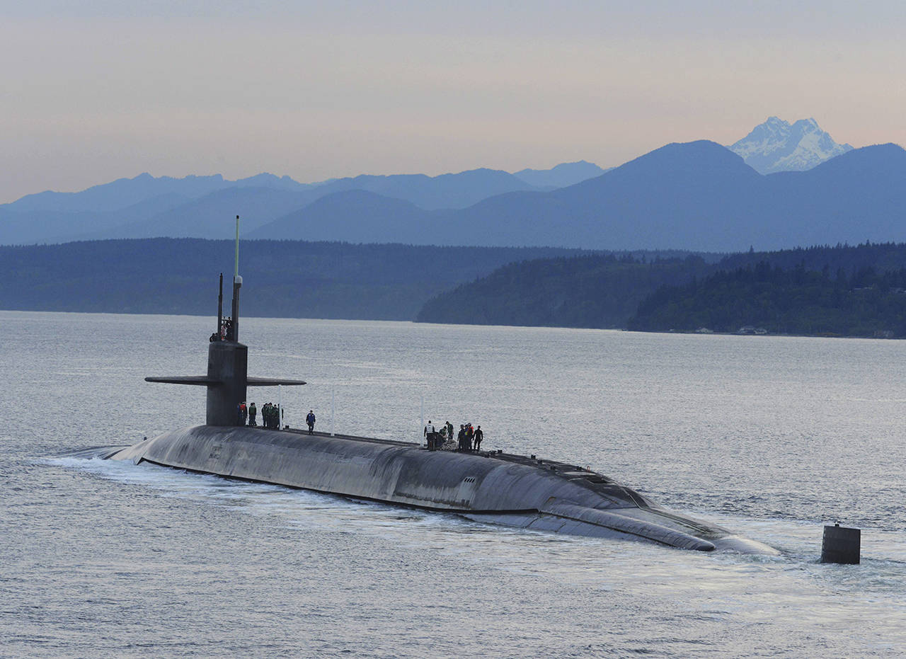 The ballistic-missile submarine USS Henry M. Jackson (SSBN 730) arrives home at Naval Base Kitsap-Bangor following a strategic deterrent patrol in this 2015 file photo. (U.S. Navy photo by Lt. Cmdr. Brian Badura/Released)