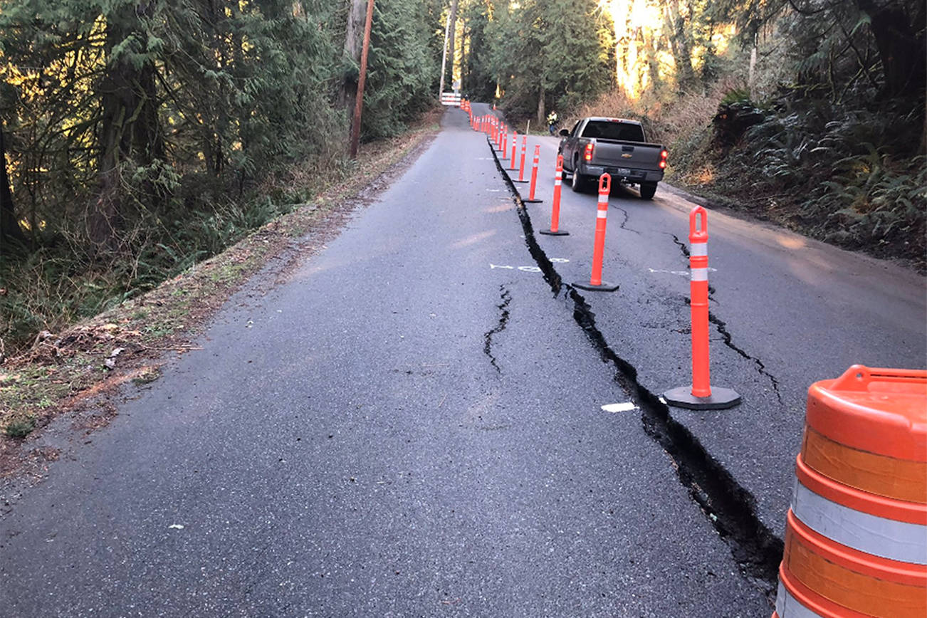 A landslide in December 2019 created a crack in this Fall City road, allowing for a one lane entry and exit. Courtesy of King County Road Services