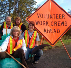 Volunteers for the city of Auburn's Adopt-a-Street Program recently during a momentary pause from their labors. Courtesy photo, City of Auburn
.