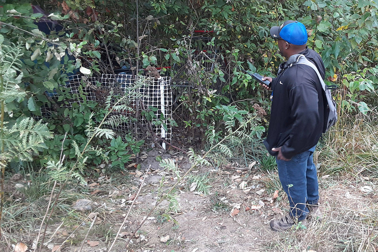 Kent Hay, Auburn’s Outreach Program Administrator, explores homeless encampments last fall in Auburn. File photo