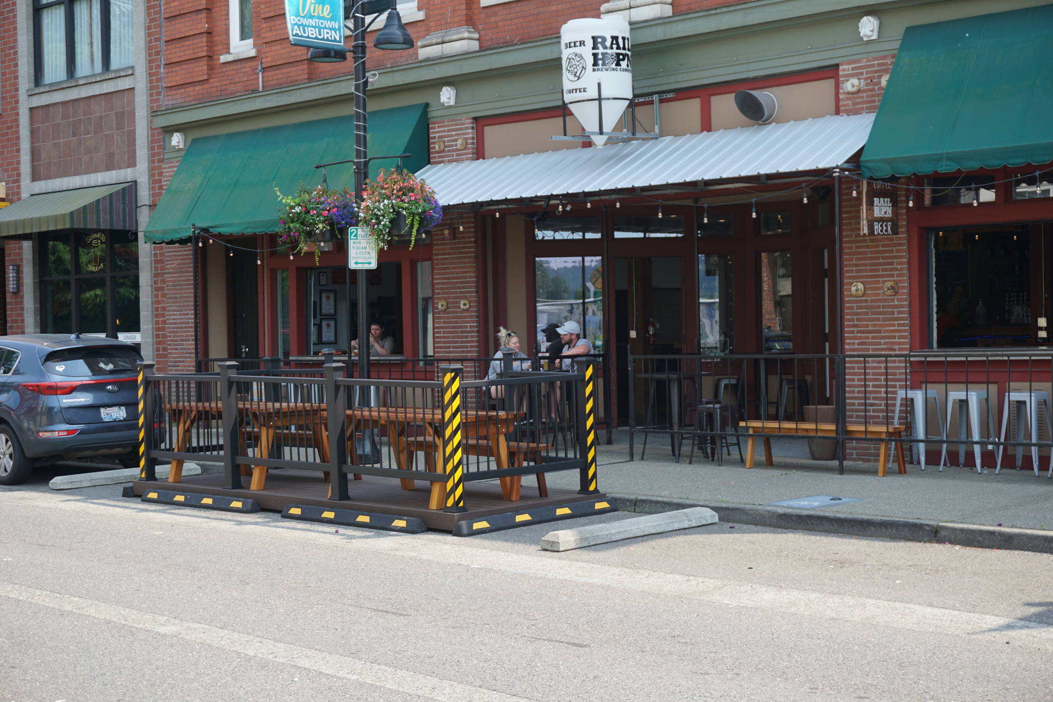 Auburn’s first parklet outside Rail Hop’n Brewery, photo shot July 2. Photo By Henry Stewart-Wood.