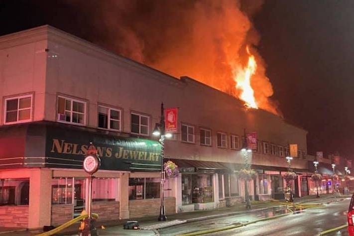 Fire inflicted heavy damage to the second floor and roof of the 2-story apartment-and ground-floor retail building at 115 East Main Street beginning late on the night of Friday, July 23, and continuing into early Saturday morning. The Valley Regional Fire Authority reports that all residents got out safely. Photo courtesy Auburn Police Department.