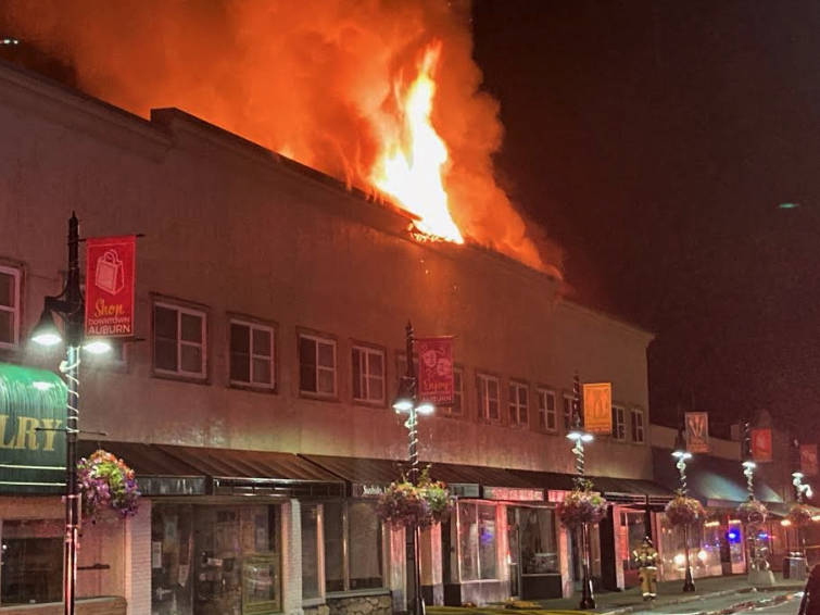 Flames burst out of the roof of Max House Apartments on July 24, 2021. Photo courtesy of the Valley Regional Fire Authority.