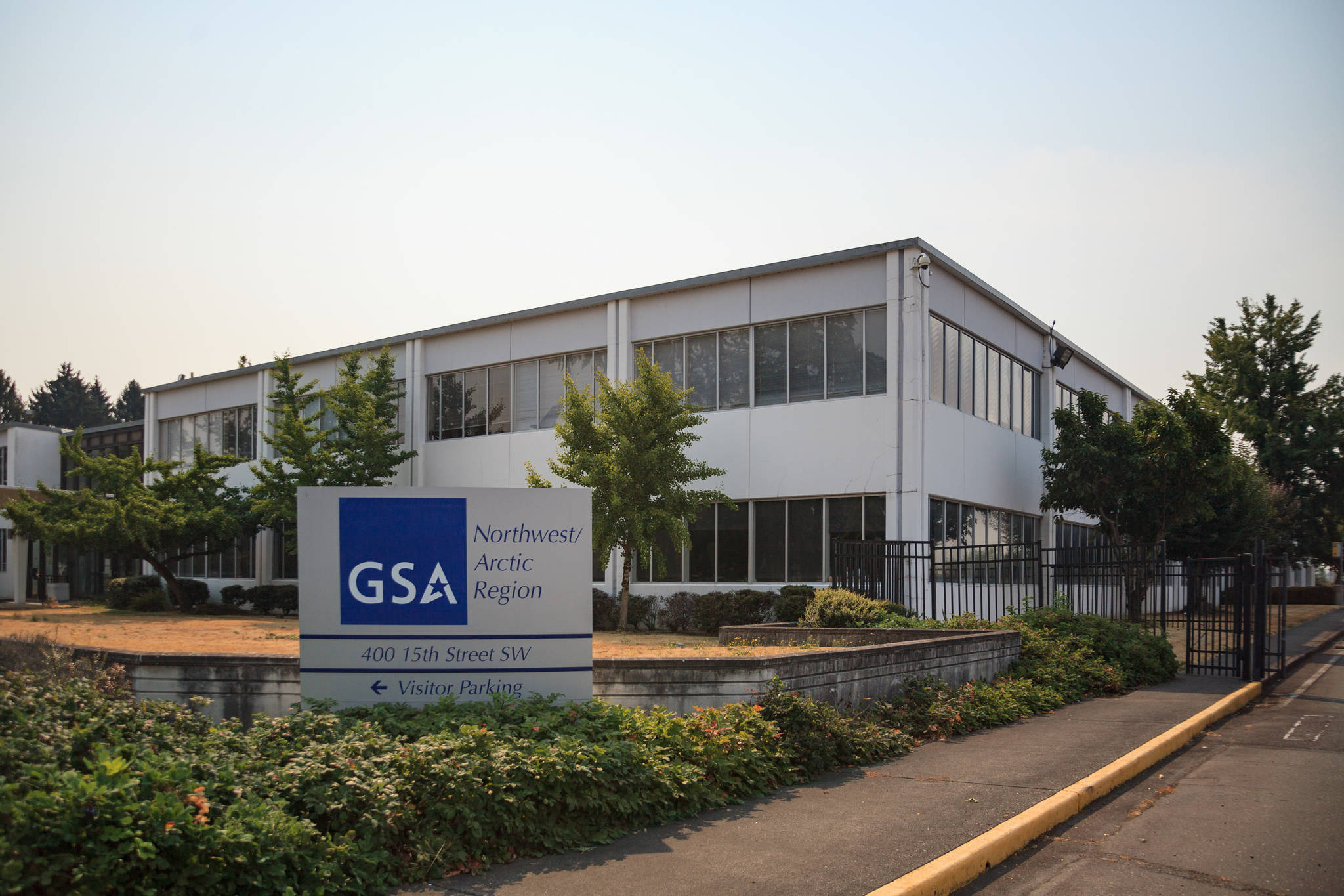 GSA building, as seen from 15th Street Southwest in Auburn on Aug. 13, 2021. The building and 129 acres of property will be sold at auction with a starting bid of $80 million. Photo by Henry Stewart-Wood/Auburn Reporter