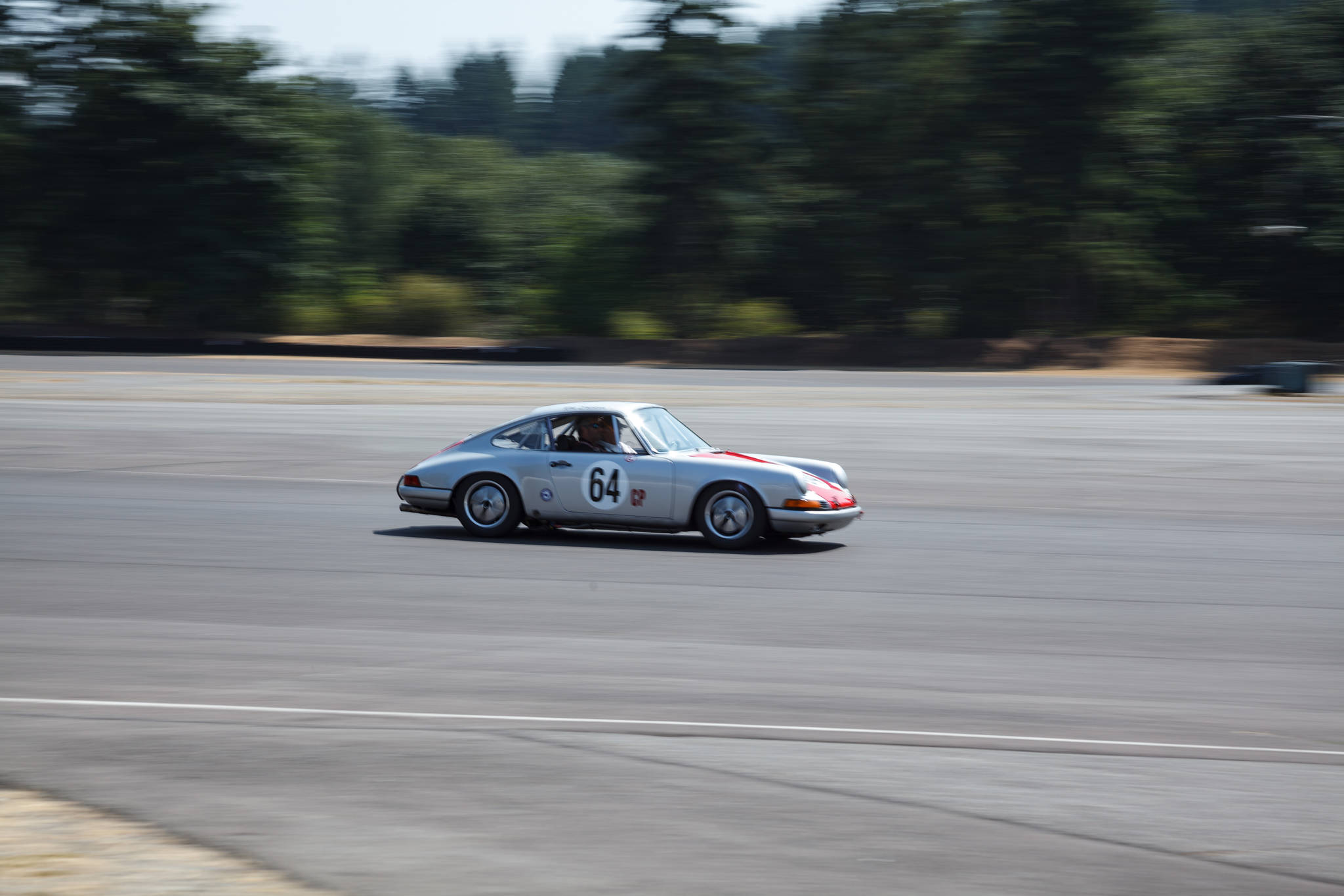 A Porsche does laps around the track during the Pacific Raceways groundbreaking event on Wednesday, Aug. 18, 2021. Photo by Henry Stewart-Wood/Sound Publishing