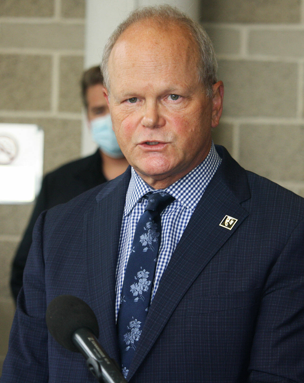 King County Prosecuting Attorney Dan Satterberg talks about accomplice vehicular homicide charges against a Kent man at a Oct. 5 press conference outside the Maleng Regional Justice Center in Kent. STEVE HUNTER, Kent Reporter