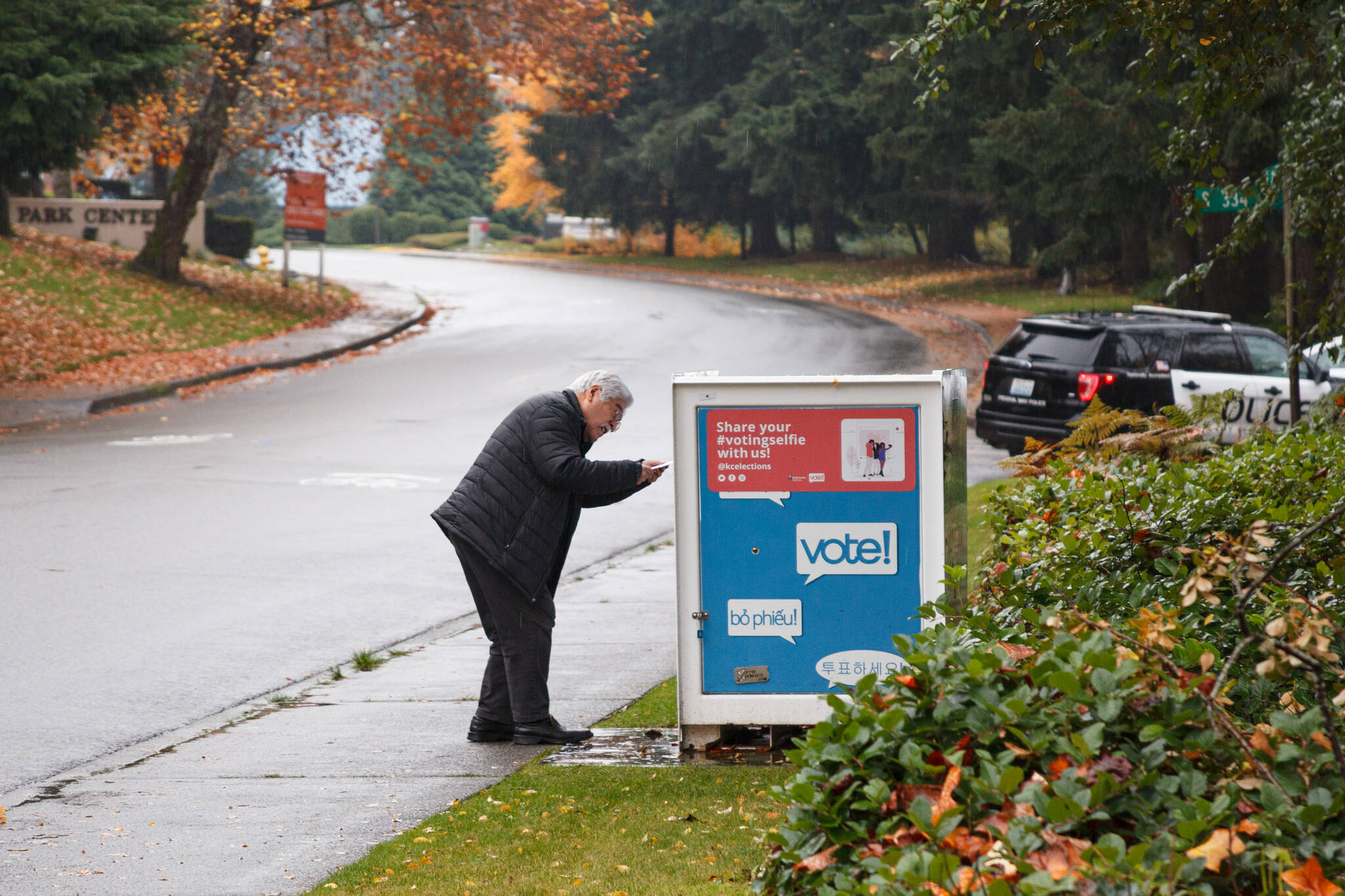A voter drops off their ballot for the King County general election on Nov. 2, 2021. Photo by Henry Stewart-Wood/Auburn Reporter