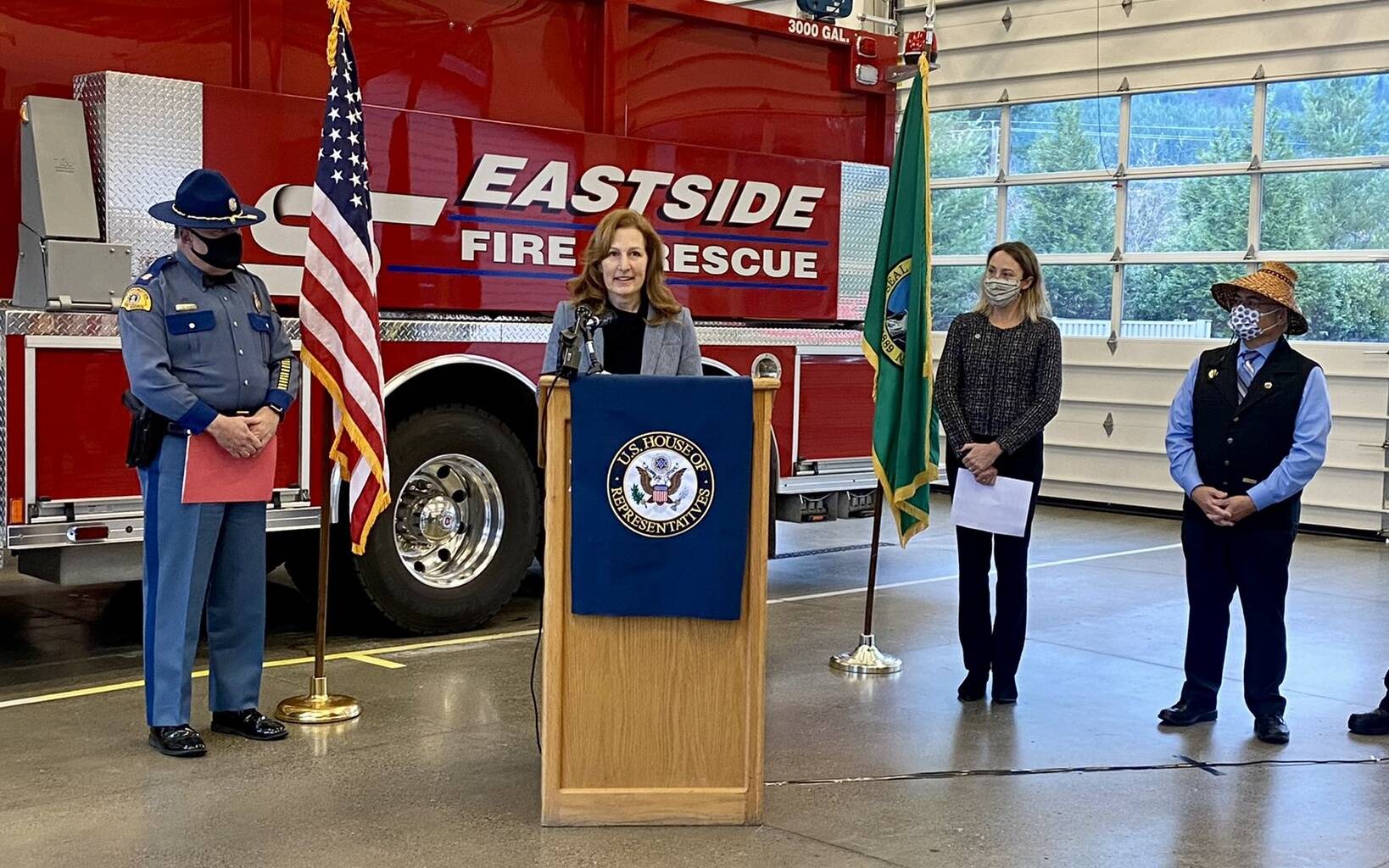 U.S. Rep. Kim Schrier speaks about State Route 18 at a press conference in North Bend on Monday, Dec. 13. From left: WSP Captain Ron Mead, Schrier, WSDOT Deputy Secretary Amy Scarton, Snoqualmie Tribal Chairman Robert de Los Angeles. Photo Courtesy of Eastside Fire Rescue.