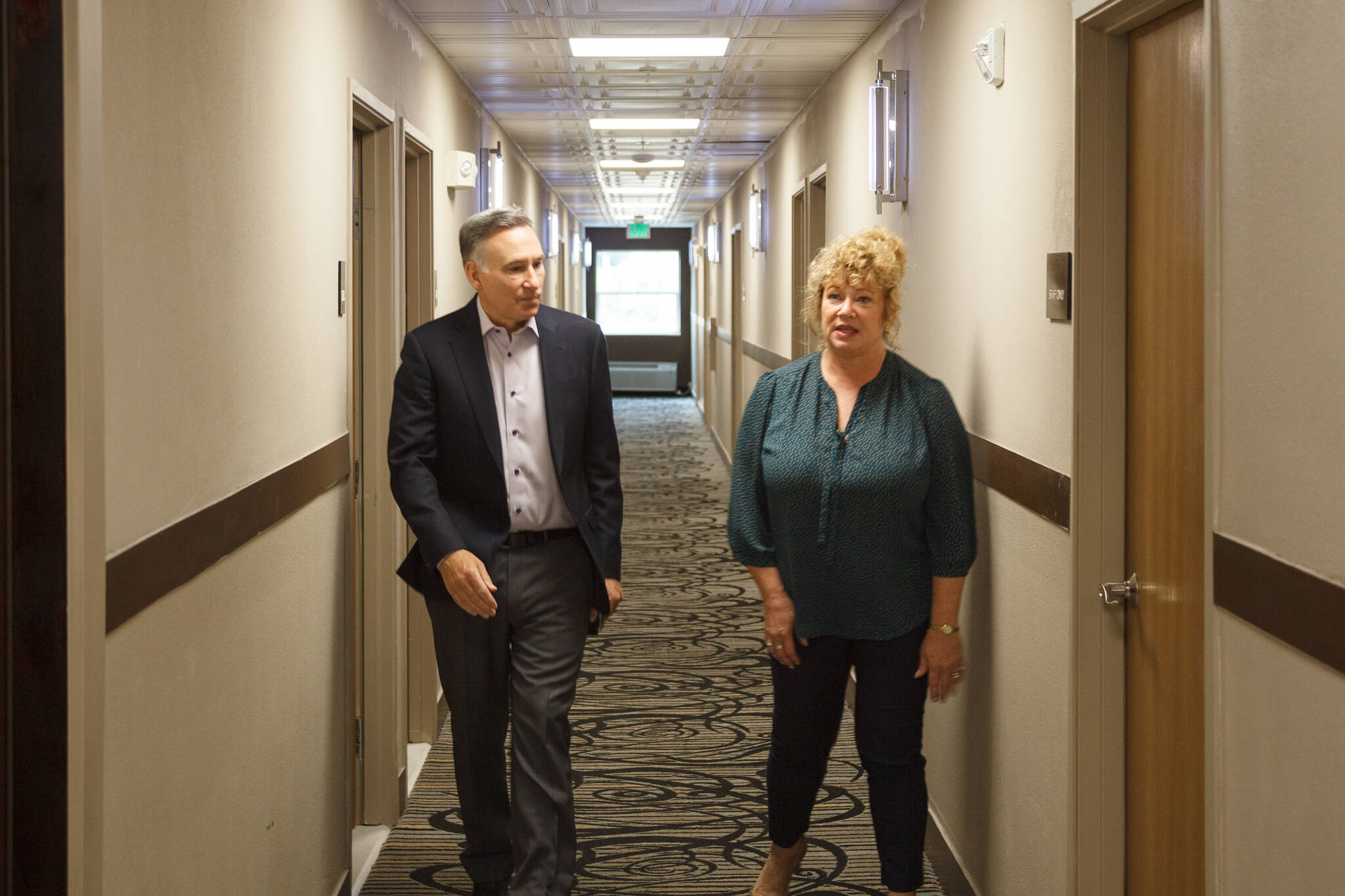 King County Executive Dow Constantine and Auburn Mayor Nancy Backus tour the Clarion Hotel in Auburn on July 20, 2021. The hotel will be used to house approximately 100 people experiencing homelessness in the area as part of the county’s Health Through Housing program. Photo by Henry Stewart-Wood/Auburn Reporter