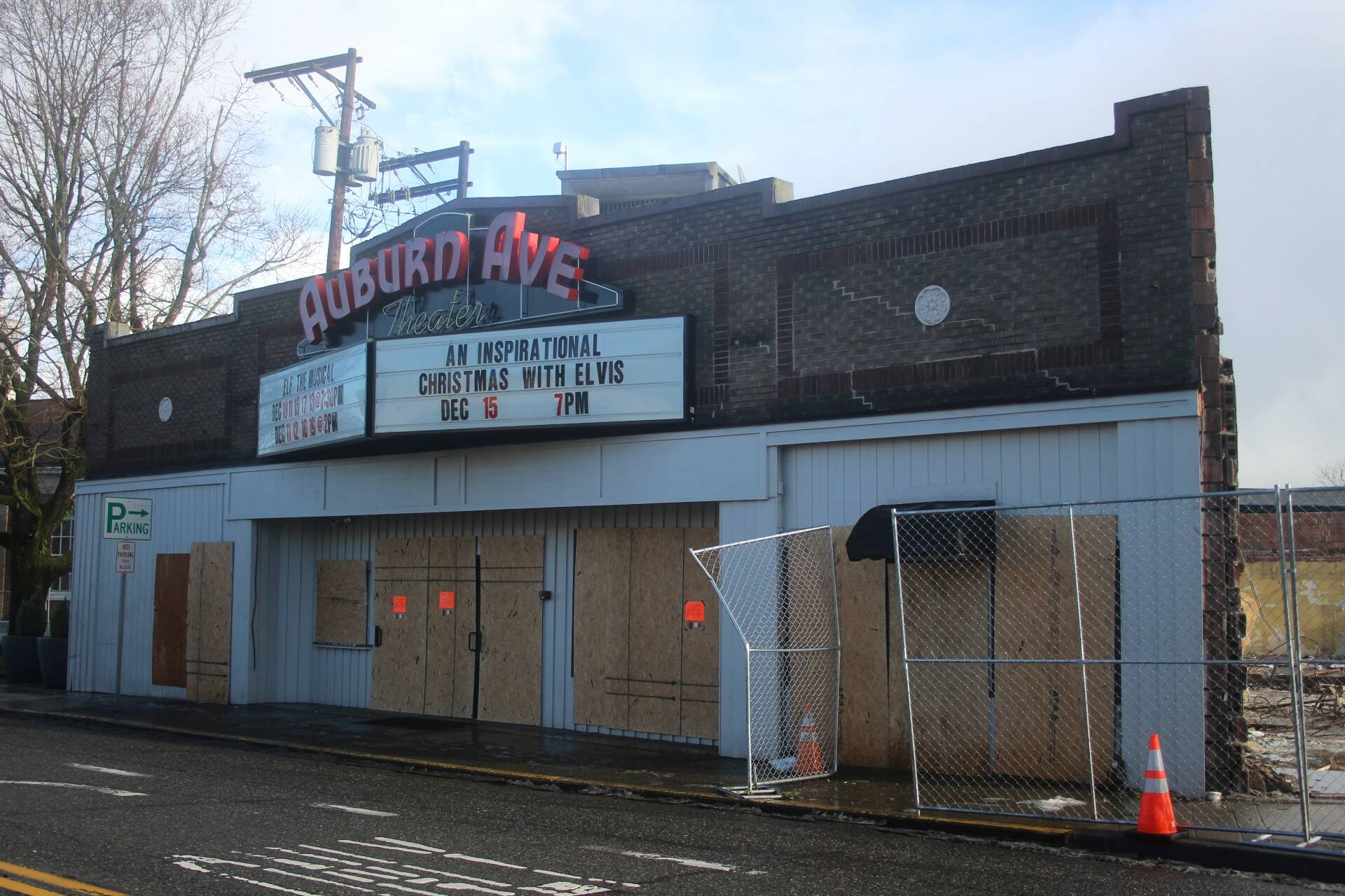 The Auburn Avenue Theater sits vacant and boarded up on Jan. 3, 2022, after being condemned due to safety concerns stemming from the demolition of the Max House Apartments complex next door. Photo by Henry Stewart-Wood/Sound Publishing