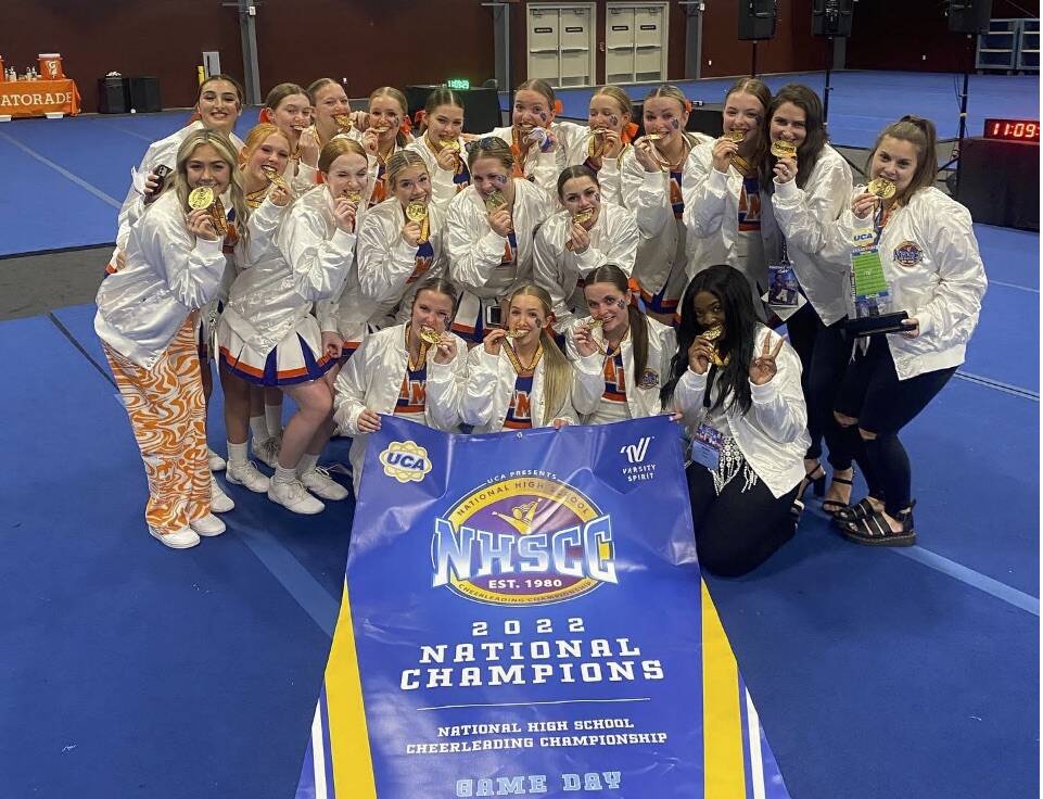 Auburn Mountainview High School cheerleading team poses for a photo with their medals after winning national championship. Photo courtesy of Auburn Mountainview High School