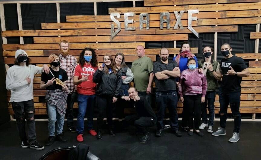 Auburn has embraced Sea Axe, the first ever axe-throwing range ever to settle in the city, as this band of customers demonstrates. Photo courtesy of Duke Managhan