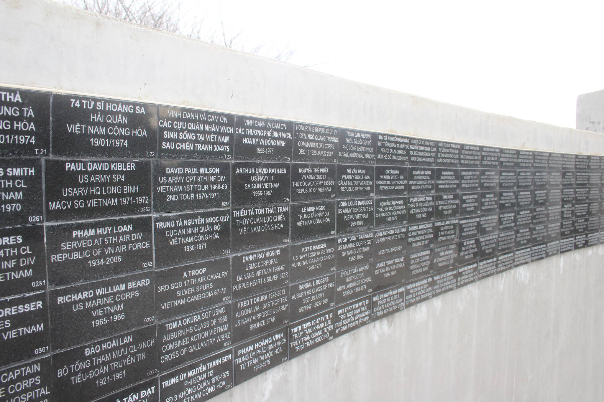 Wall of plaques honoring veterans of the Vietnam War at the Vietnam War Memorial in Les Gove Park. Photo by Henry Stewart-Wood.