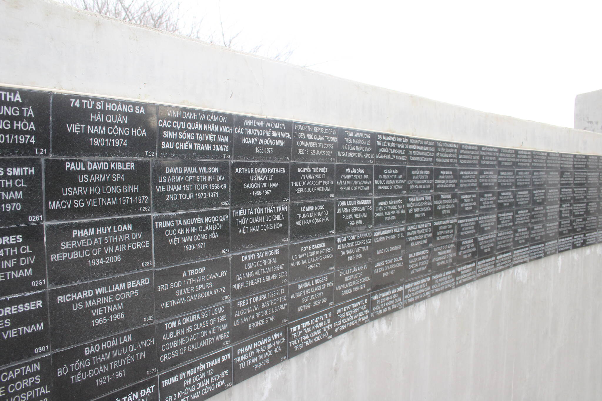 Wall of plaques honoring veterans of the Vietnam War at the Vietnam War Memorial in Les Gove Park. Photo by Henry Stewart-Wood.