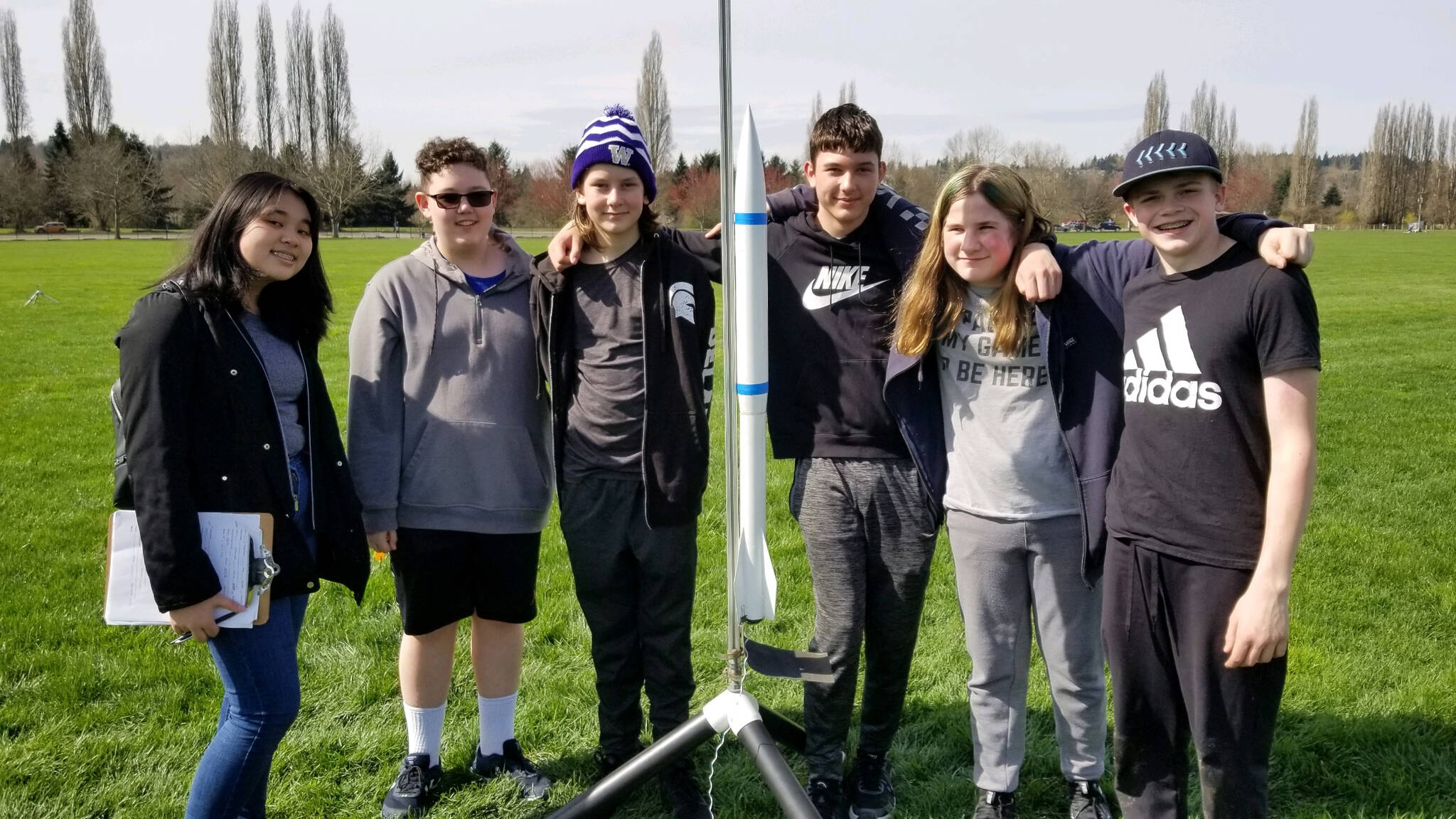 Photo courtesy of Marc Deaver
(Left to right) Cascade Middle Schoolers Melinda Mai, Jordan Englert, Dawson Delaney, Mason Coates, Liam Jones and CJ Baxter pose for a photo next to the rocket they designed and built for the American Rocketry Challenge.