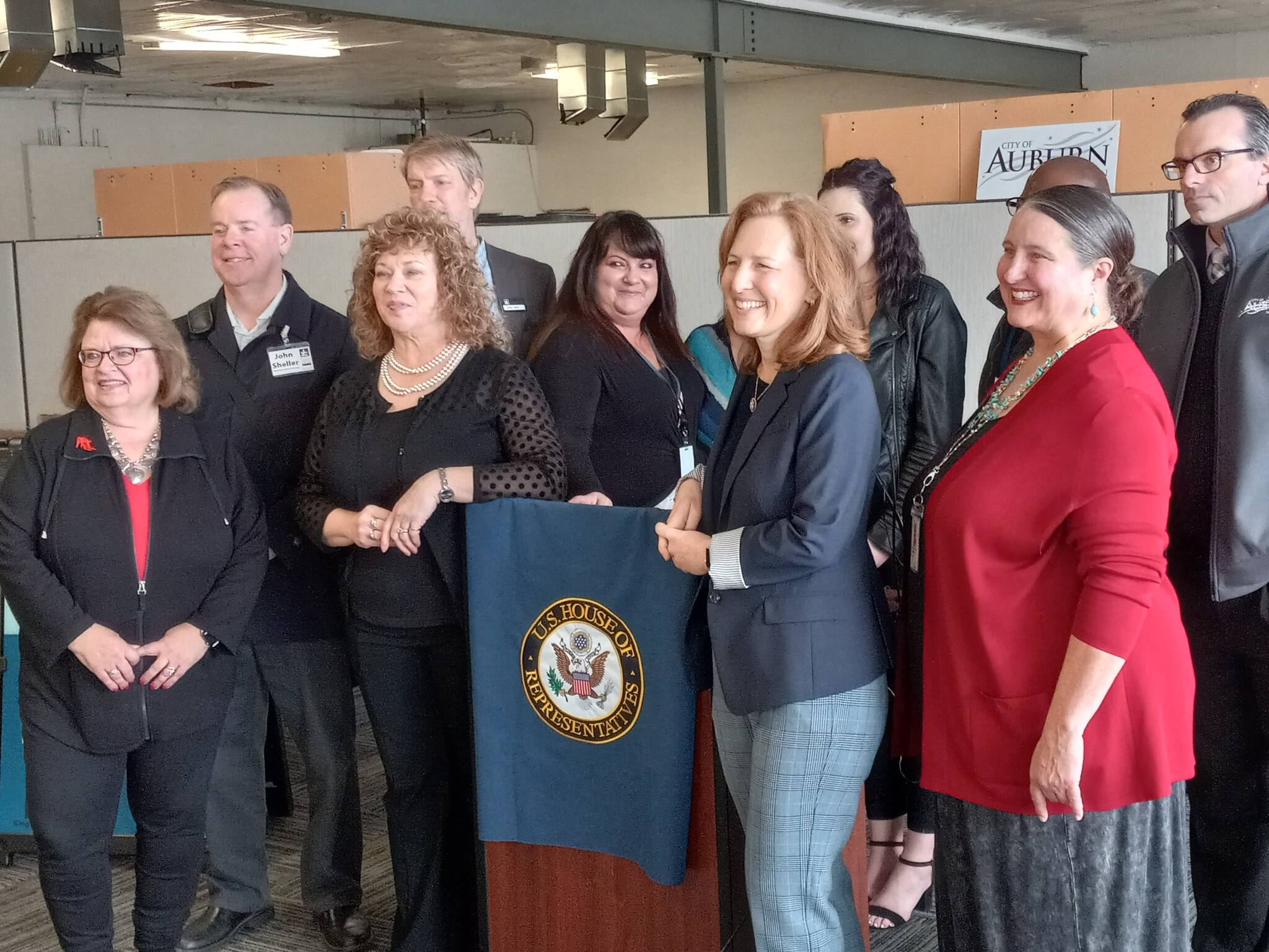 Photo by Robert Whale, Auburn Reporter
City officials and care providers laud U.S. Congresswoman Kim Schrier (D-District 8) for securing $500,000 in federal funds for the build-out of the Auburn Community Resource Center at a press conference April 14.