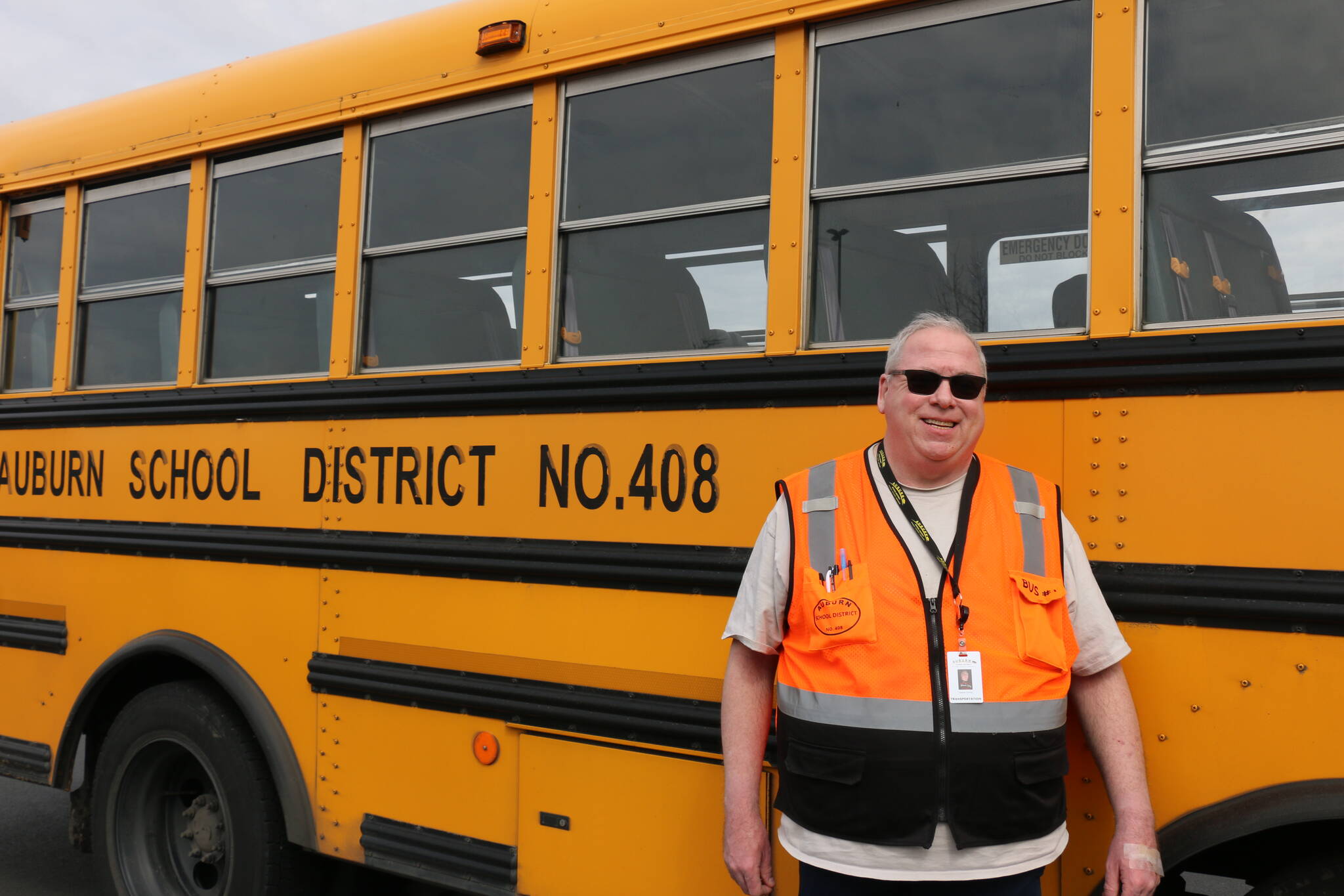 Photo courtesy of the Auburn School District
Deane Davies and his school bus.