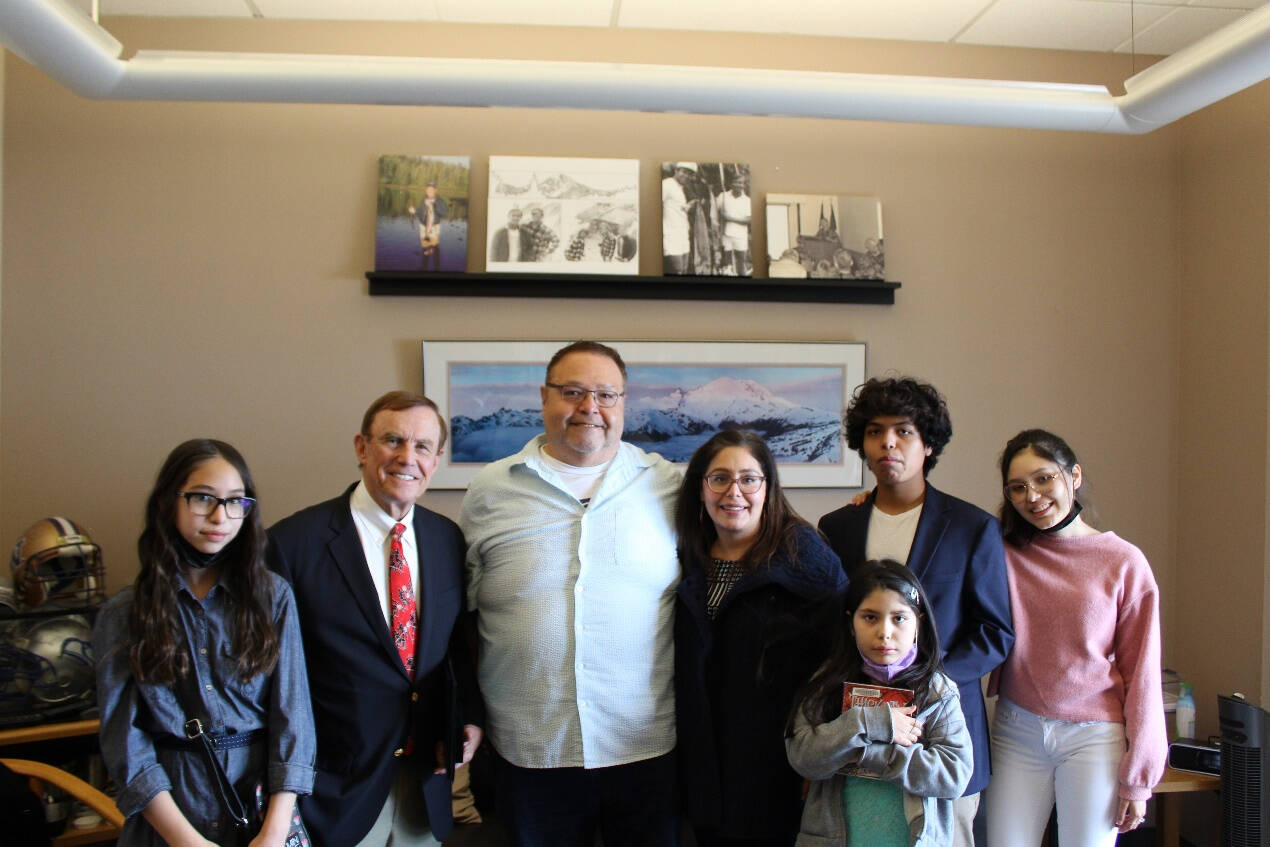 John Daniels Jr. and his family pose for a photo with King County Councilmember Pete von Reichbauer. Photo courtesy of Pete von Reichbauer’s office