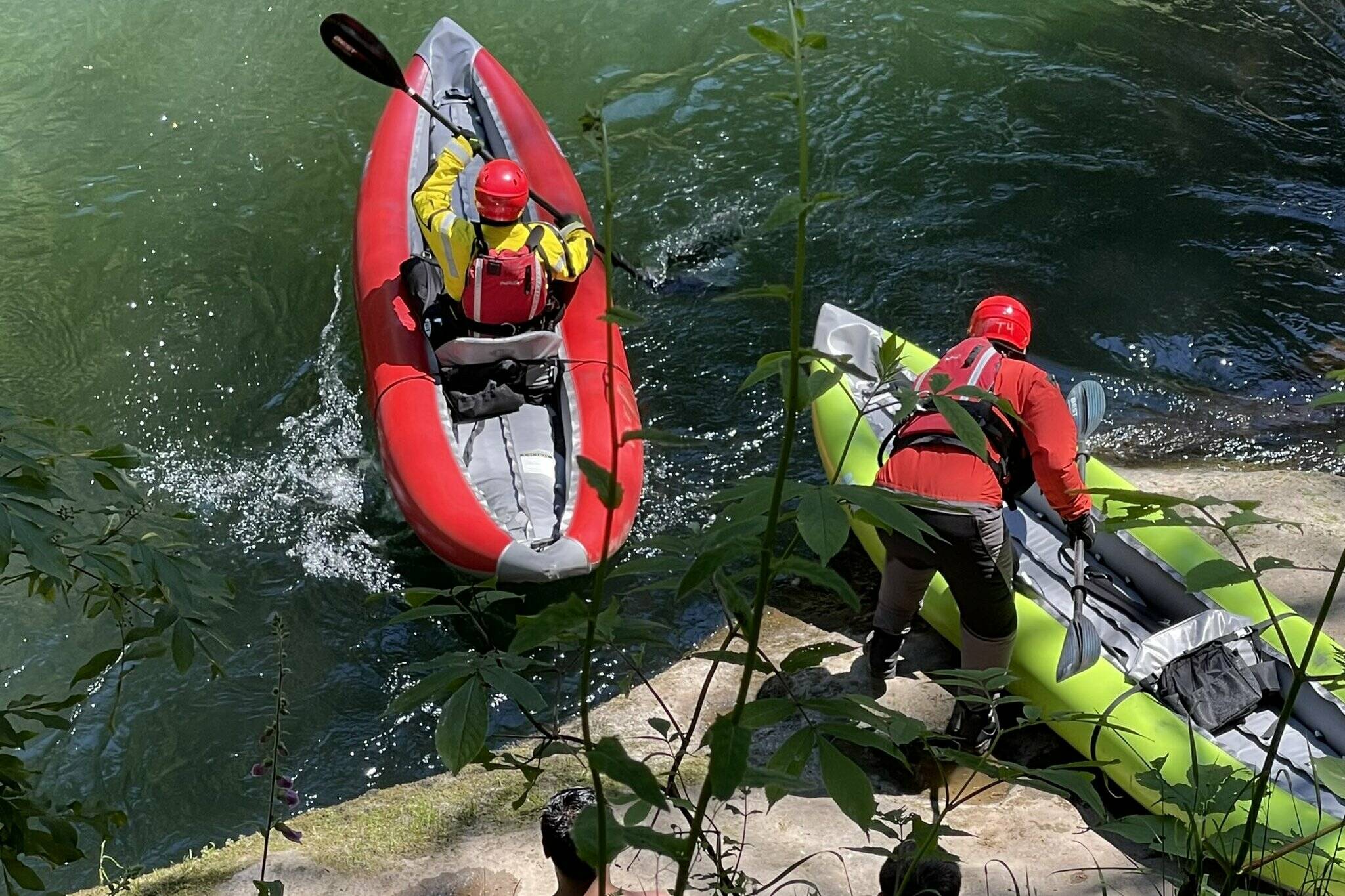 Photo from Puget Sound Fire via Twitter
Firefighters from Valley Regional Fire Authority use kayaks to search the Green River on Saturday afternoon for a missing swimmer. The search was unfortunately unsuccessful.