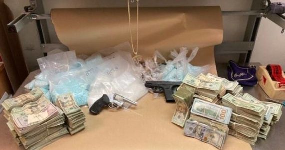 Auburn Police Department reports it seized 82,400 fentanyl pills, 1.8 pounds of heroin, 3.8 pounds of methamphetamine, $173,138 in U.S. currency and two firearms from a Kent apartment April 20 and arrested its 32-year-old tenant. Courtesy photo