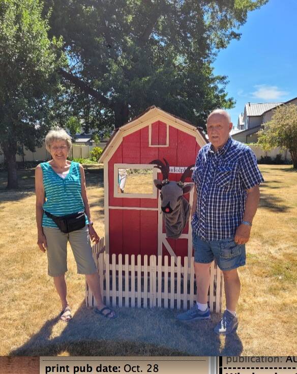 Courtesy photo/Janet and Jim Wells
Flanked by Janet and Jim Wells, Rudolph waits in his barn for his appearance at the rebuilt Santa House downtown this holiday season.