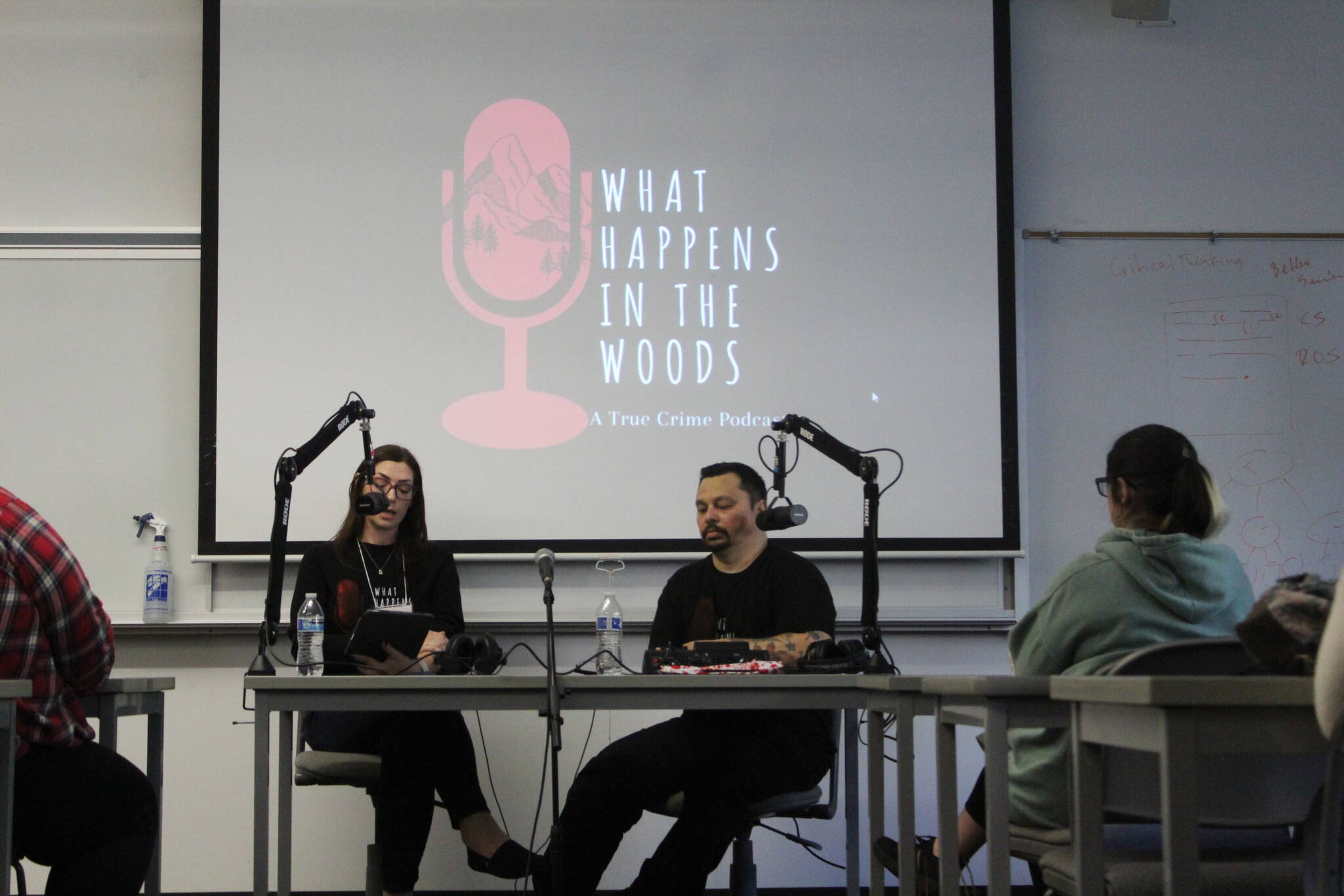 Co-hosts Jess and Brice of “What Happens In The Woods” recorded a live podcast episode about “The Jungle,” a homeless encampment in Seattle. Photo by Bailey Jo Josie/Sound Publishing.