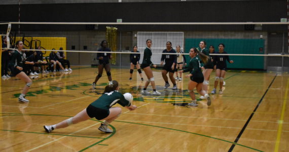 Senior Maya Wriston with a dig in the third set against Todd Beamer. Photo by Ben Ray/Sound Publishing