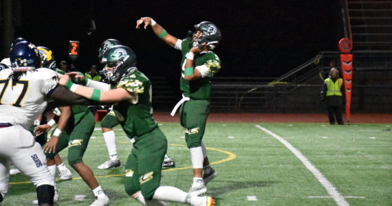 Senior QB Amari Goodfellow looking for a touchdown deep in Southridge territory. Photo by Ben Ray/Sound Publishing