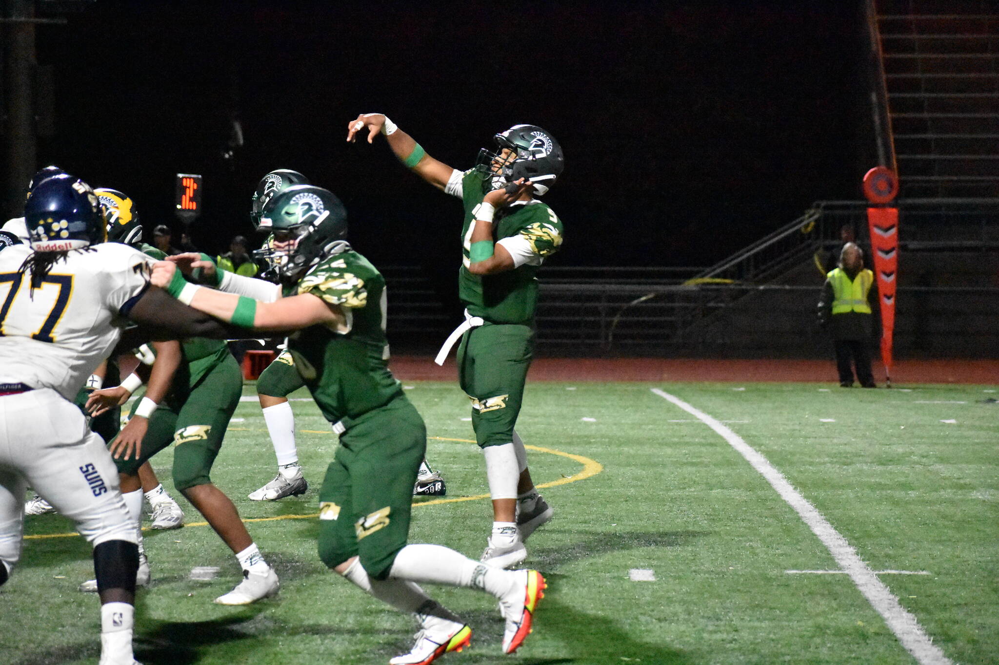 Senior QB Amari Goodfellow looking for a touchdown deep in Southridge territory. Photo by Ben Ray/Sound Publishing