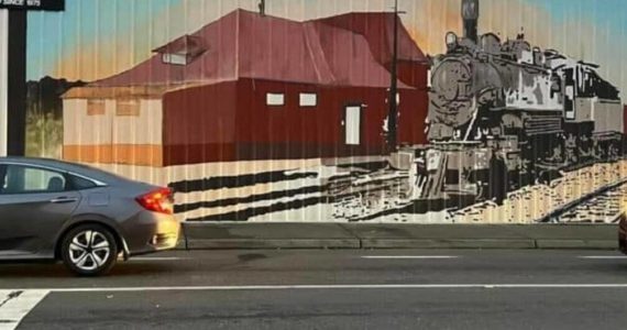 In Seattle artist Mira Hoke's mural, the old Auburn Depot lives again on the west side of the Agrishop. Photo courtesy of Downtown Auburn Cooperative.