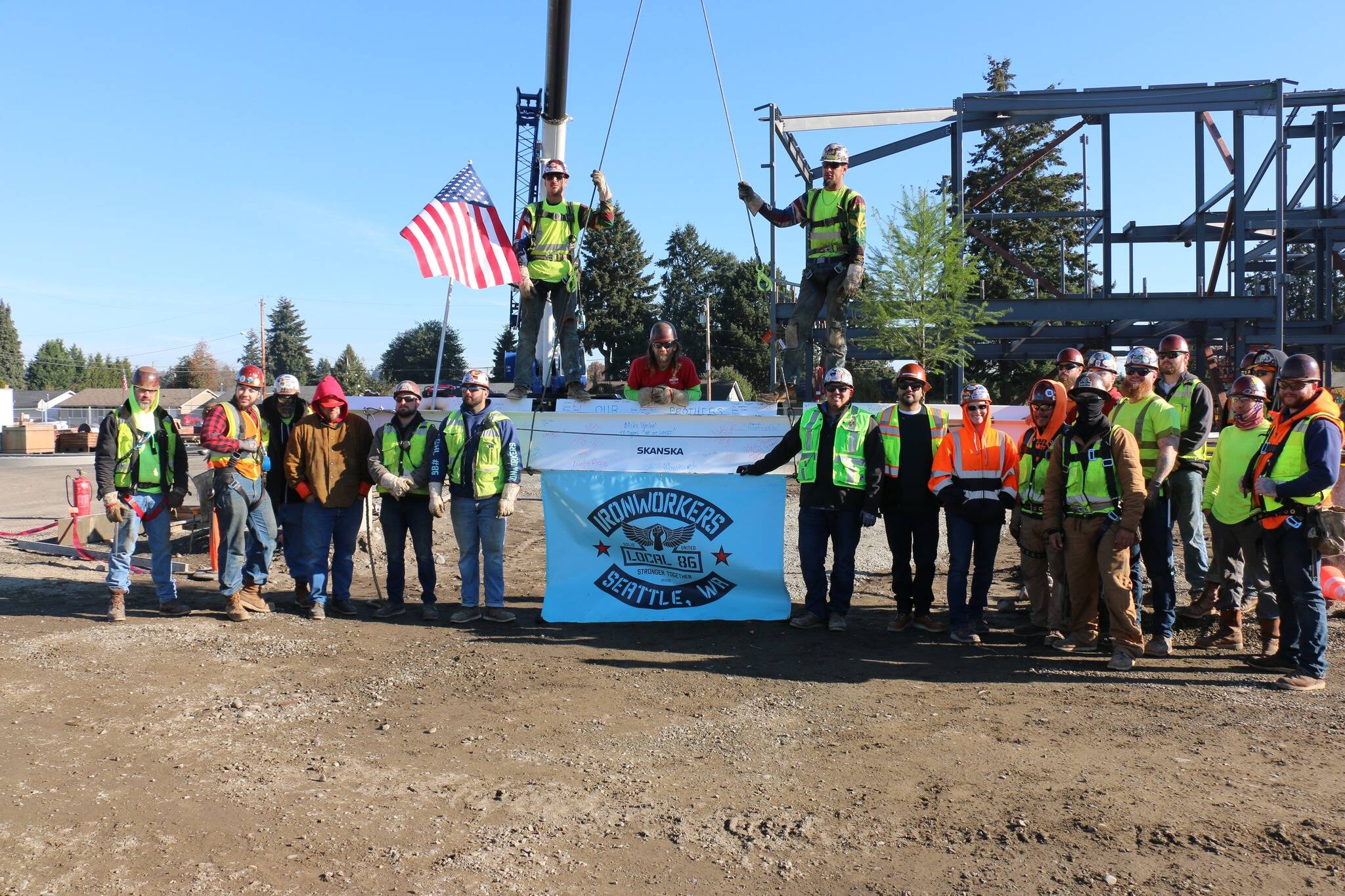 Iron Workers Local Union #86 with the topping out beam Nov. 15 at Terminal Park Elementary School in Auburn. Courtesy photo