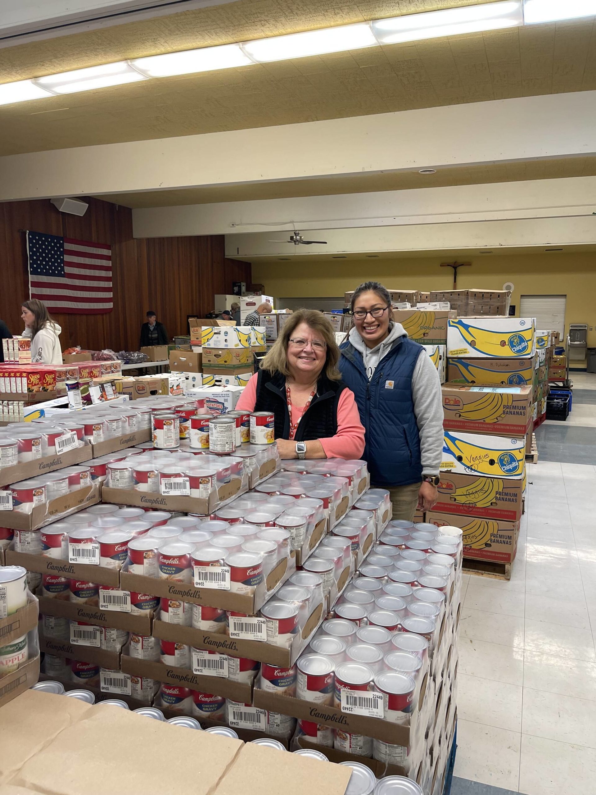 Debbie Christian and Leticia Brito of the Auburn Food Bank. Photo by Carol Greiling/Auburn Reporter