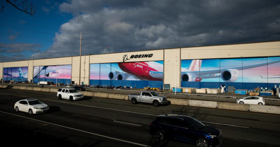 Traffic moves along Highway 526 in front of Boeing’s Everett Production Facility on Nov. 28, 2022, in Everett, Washington. (Olivia Vanni / Sound Publishing)