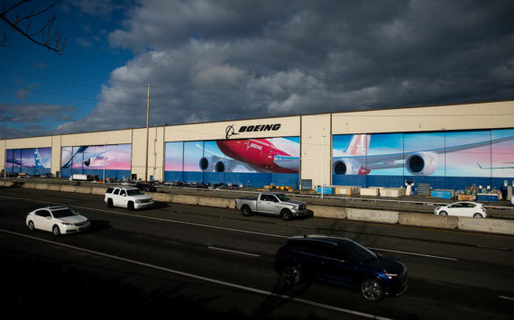 Traffic moves along Highway 526 in front of Boeing’s Everett Production Facility on Nov. 28, 2022, in Everett, Washington. (Olivia Vanni / Sound Publishing)