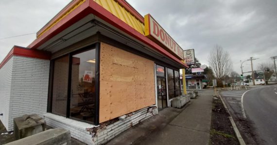 Auburn Police are still looking for the driver of the vehicle that plowed into Donut Star on Dec. 6, the latest of many to do so in the building’s history. Photo by Robert Whale, Auburn Reporter