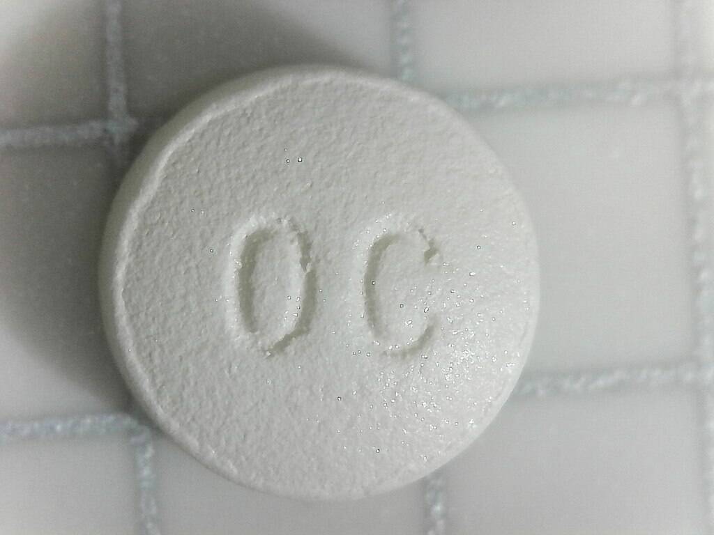 Oxycodone pill. (Photo courtesy of Wikipedia)