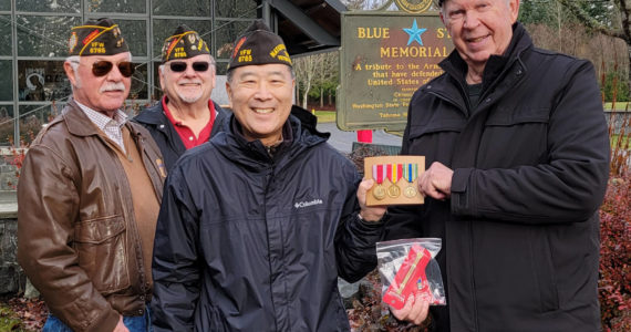 COURTESY PHOTO, VFW Post 6785
From left to right, Alan B’Hymer, USAF Korea Defennse veteran; Richard Klug, USAF Vietnam War veteran; and Walt Tanimoto, US Army Iraq War veteran, honor Richard Sample, US Army Korea Defense veteran, with three awards.