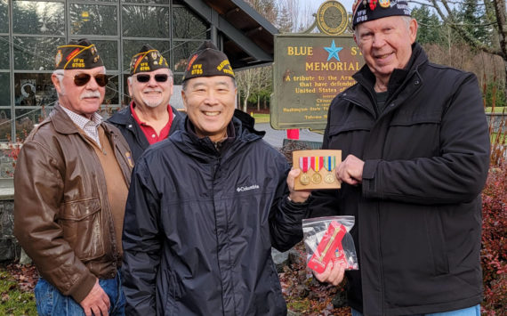 COURTESY PHOTO, VFW Post 6785
From left to right, Alan B’Hymer, USAF Korea Defennse veteran; Richard Klug, USAF Vietnam War veteran; and Walt Tanimoto, US Army Iraq War veteran, honor Richard Sample, US Army Korea Defense veteran, with three awards.