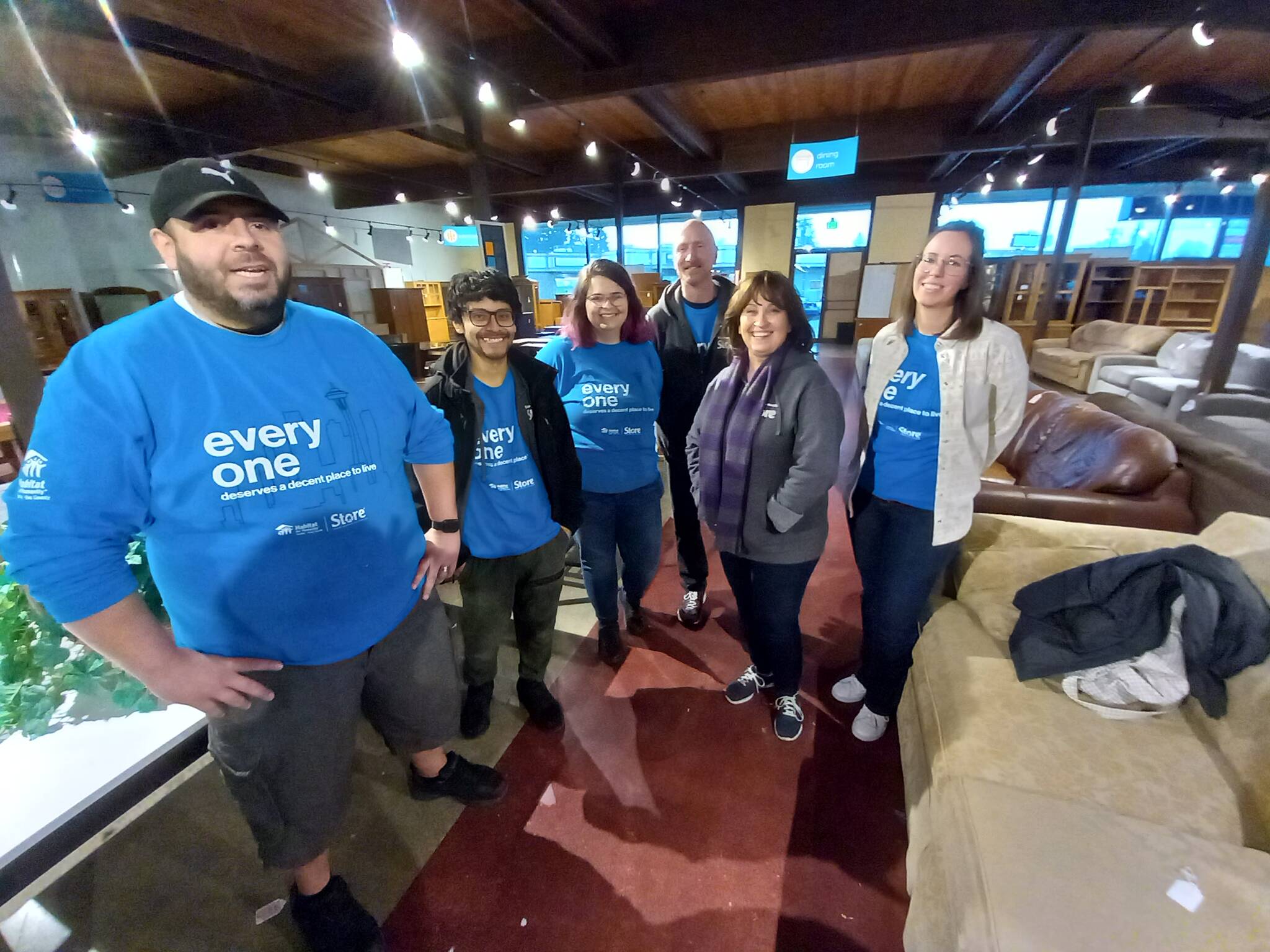 The hard-working staff of Habitat for Humanity’s Auburn thrift store includes, from left, Carlos Sanchez, Charlie Navarro, Alison Burgoyne, John Hanson, Crystal Bareno and Amy Sullivan. Photo by Robert Whale, Auburn Reporter